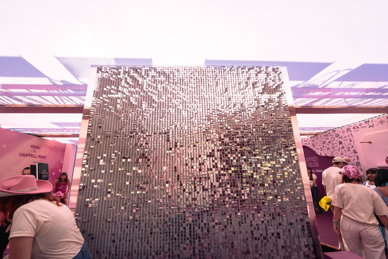 Silver sequin wall inside the eBay and Chappell Roan pavilion