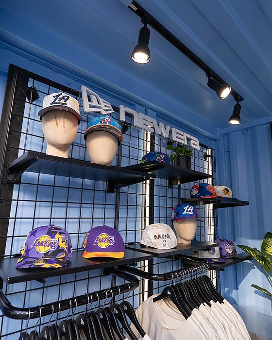 New Era cap and apparel display shelving in the retail build