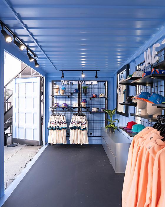 New Era retail interior with cap and apparel displays