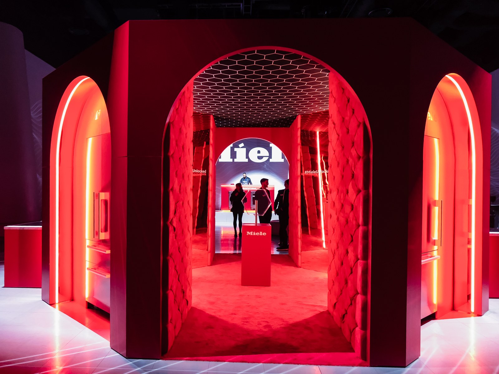 Arched entry into the Miele Unlocked environment at AREA15