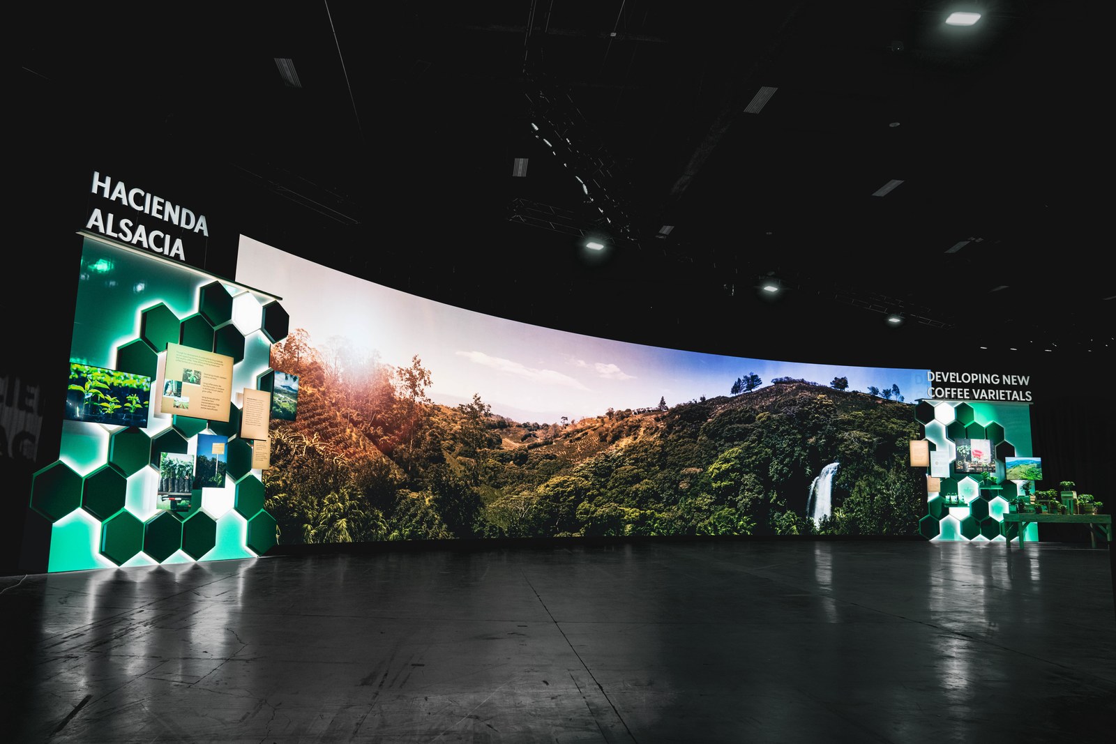 The curved Hacienda Alsacia LED wall lit in the darkened hall at the Starbucks leadership event